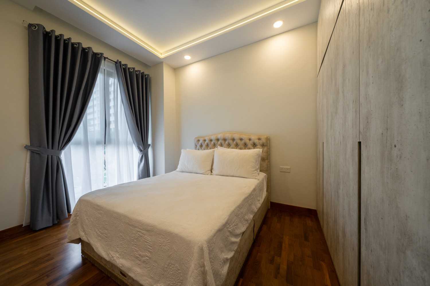 Modern Bedroom with Cove Lighting and Ceiling Light