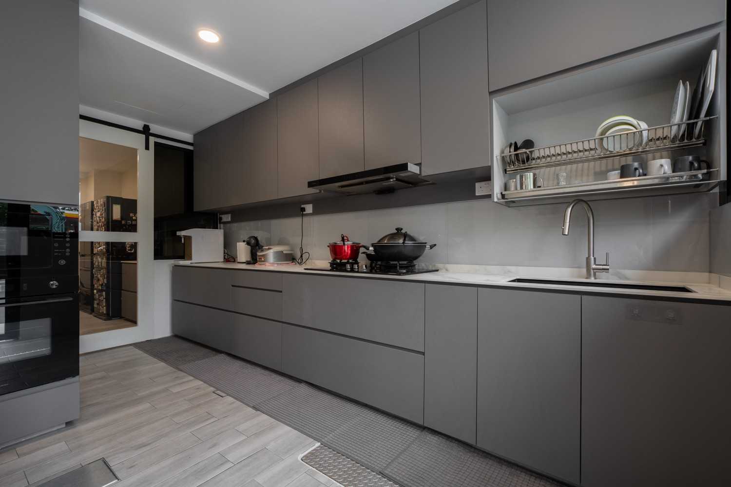 Modern Kitchen with Wood Flooring and Kitchen Window