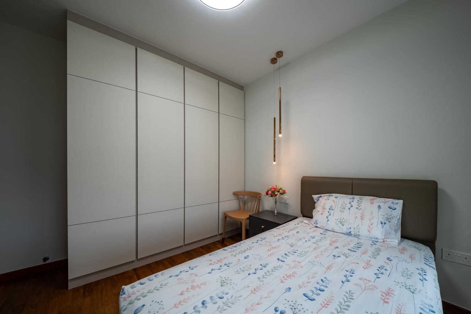 Modern Bedroom with Ceiling Light and Wardrobe