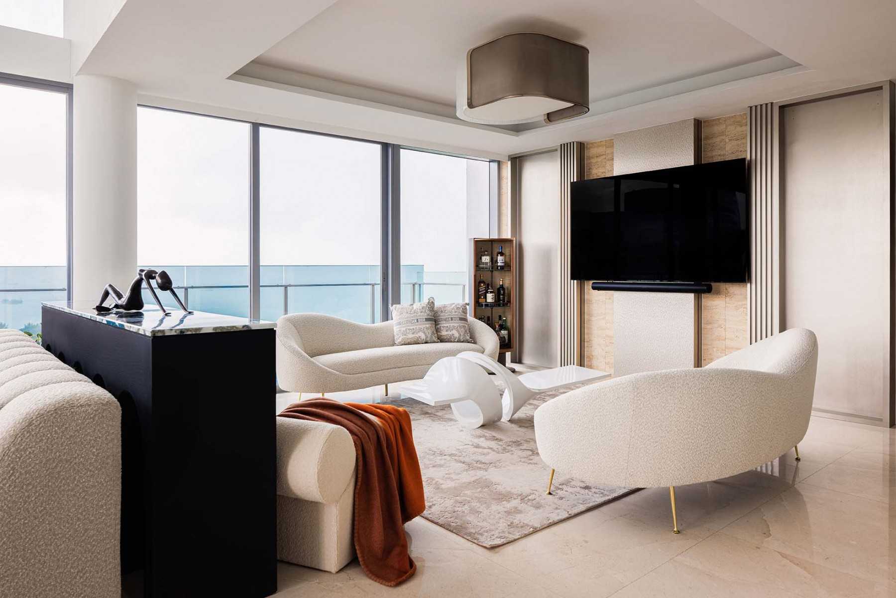 Contemporary Living Room with Feature Wall and Cove Lighting