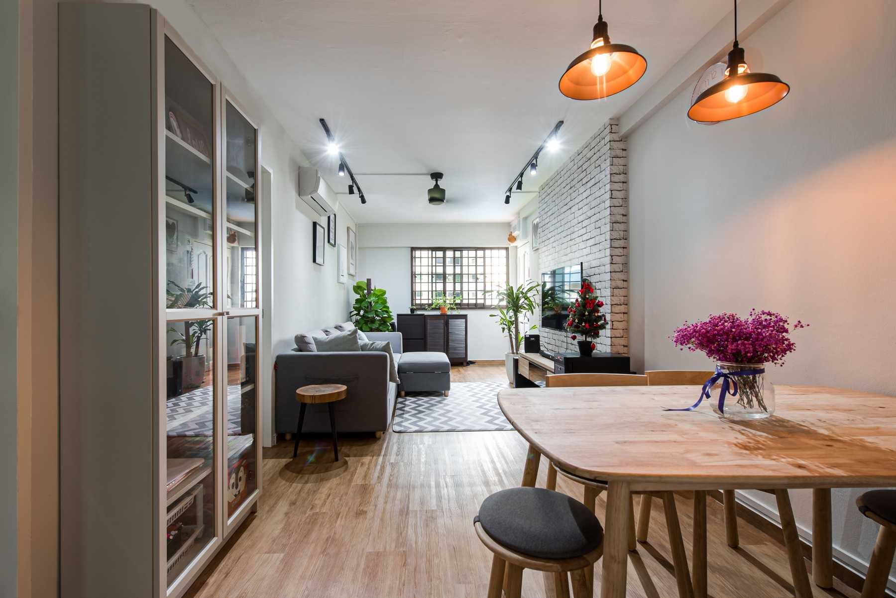 Minimalist Dining Room with Ceiling Fan and Sofa