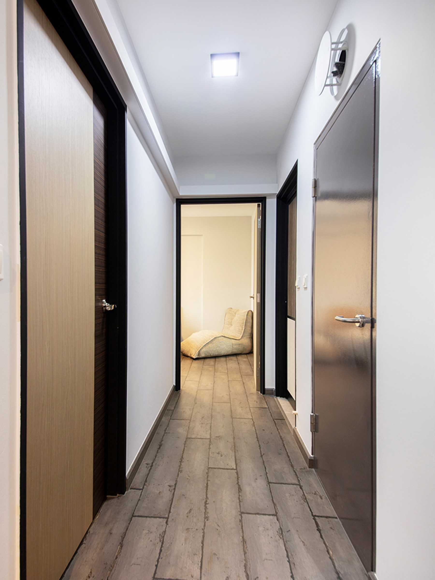 Industrial Entryway with Feature Wall and Sofa