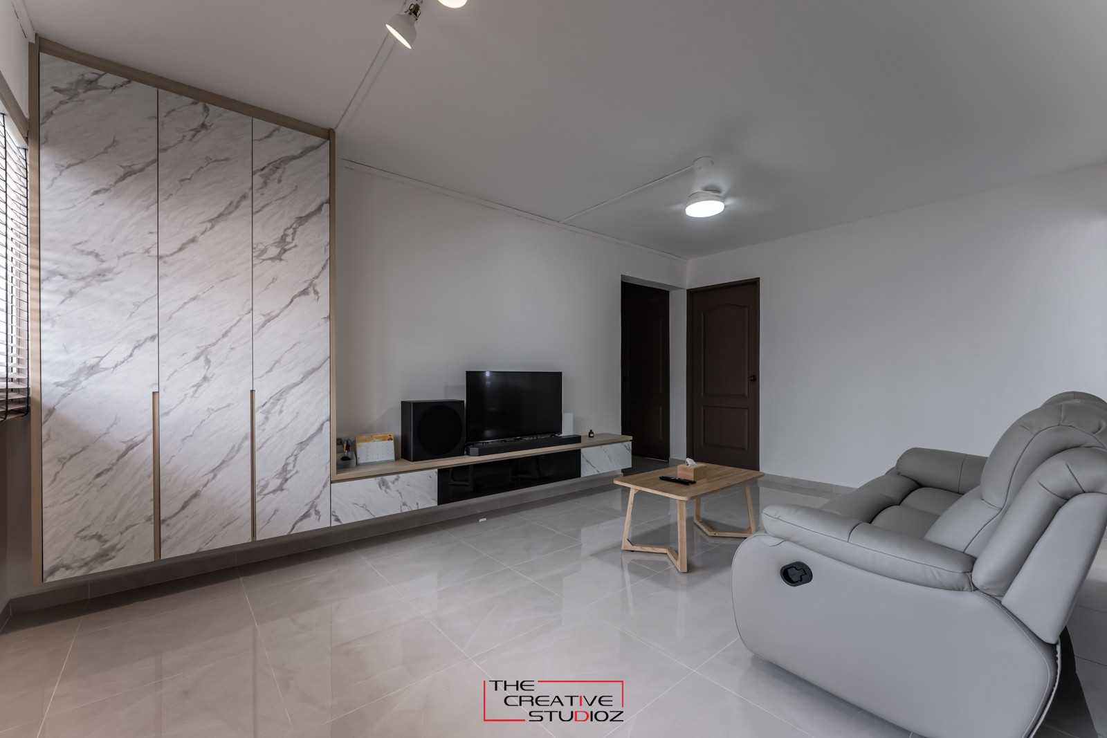 Scandinavian Living Room with Homogeneous Tiles and TV Console
