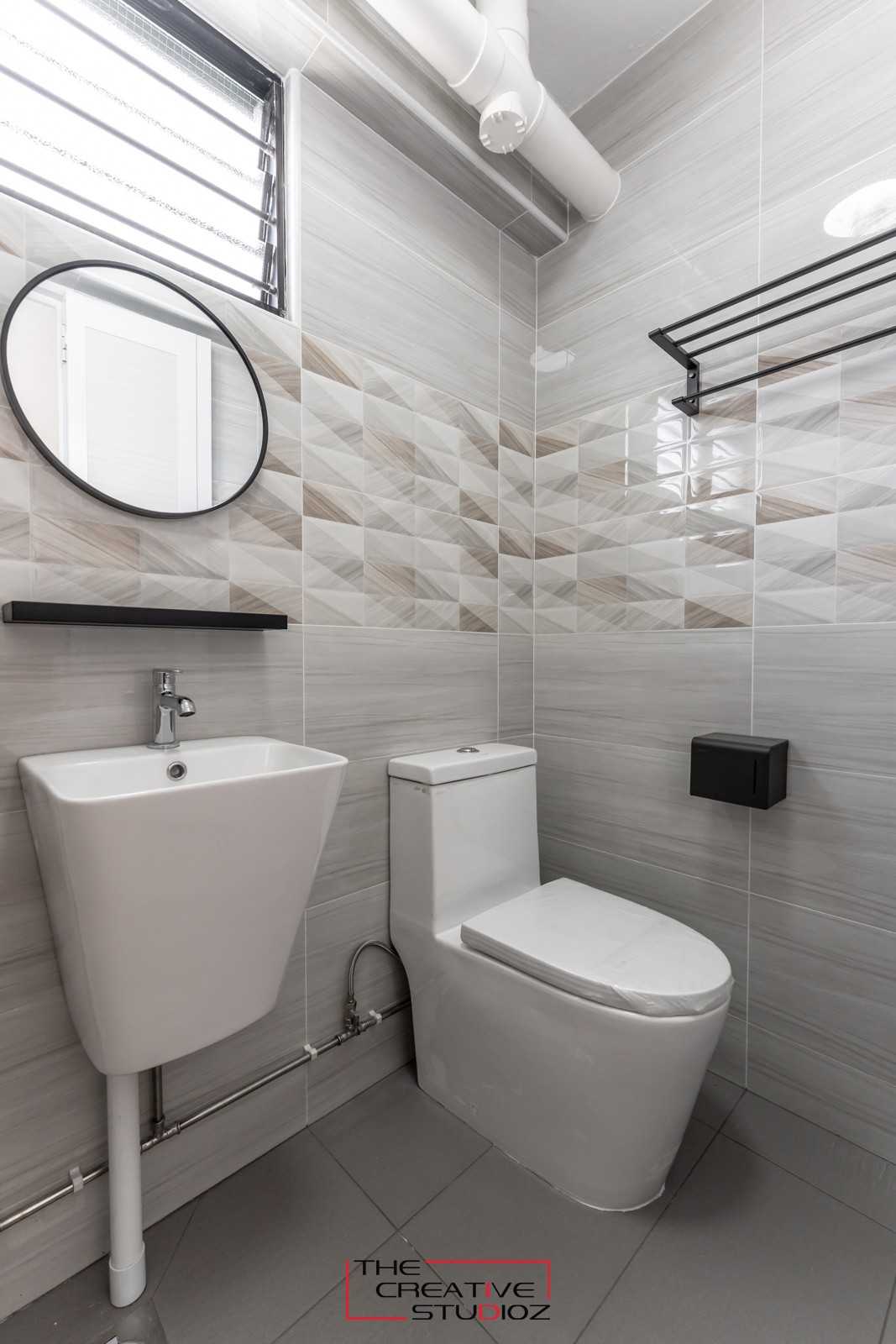 Scandinavian Bathroom with Homogeneous Tiles and Mirror
