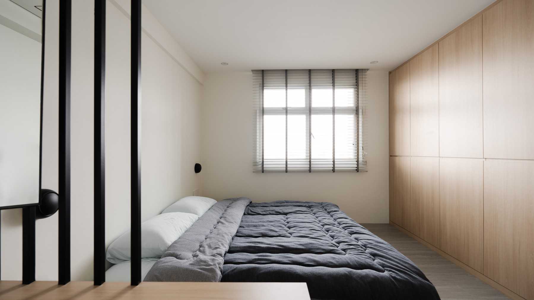 Modern Bedroom with Vinyl Flooring and Closet