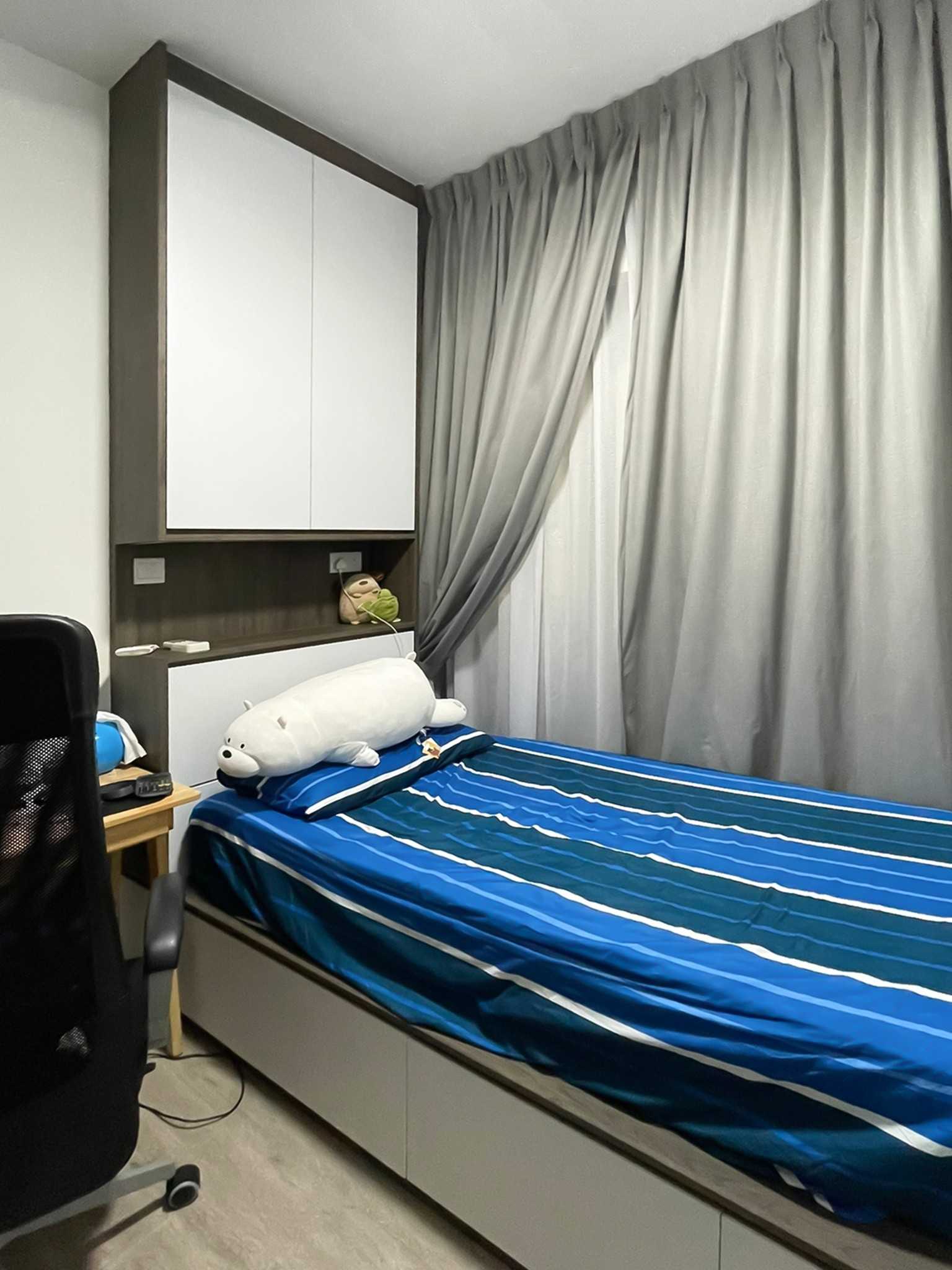 Scandinavian Bedroom with Built-in Bed and Paintings