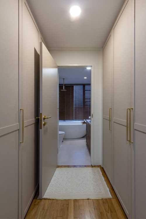 Minimalist Walk-in Wardrobe at Jurong West Central 3