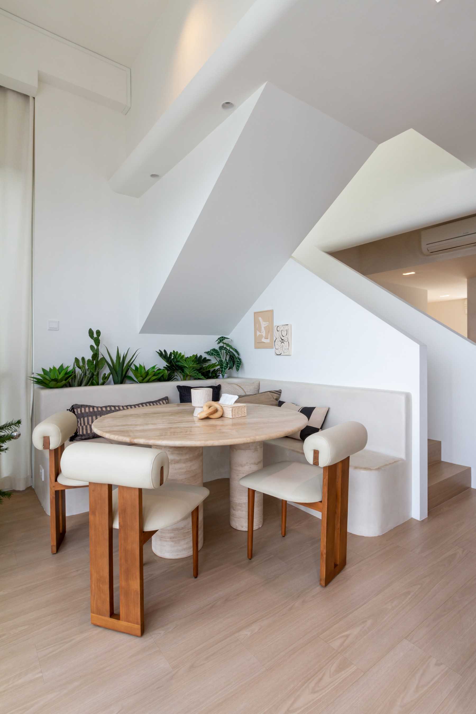 Minimalist Dining Room with Dining Table and Houseplants