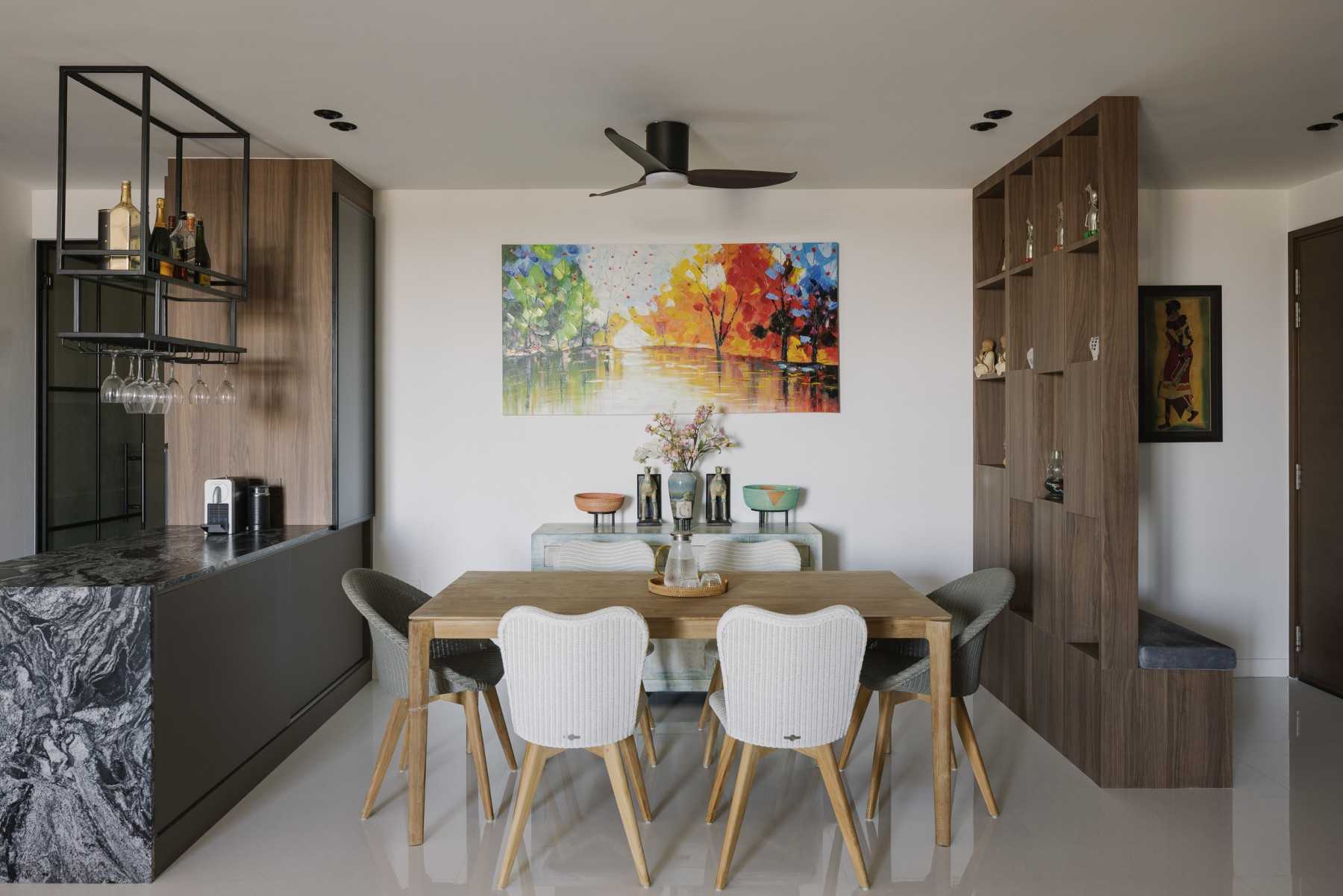 Modern Dining Room with Artwork and Bar Counter