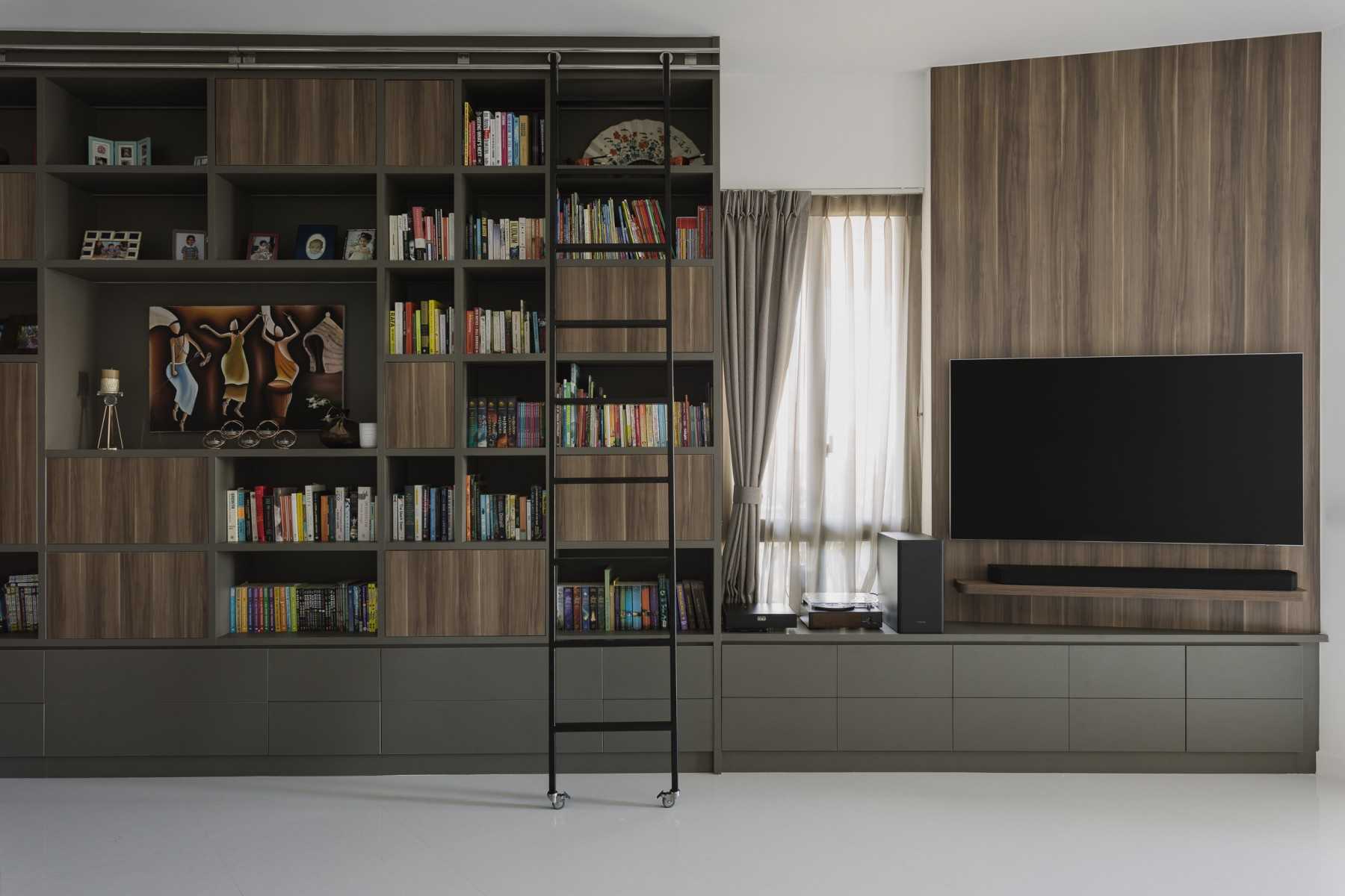 Modern Living Room with Bookshelf and TV Console