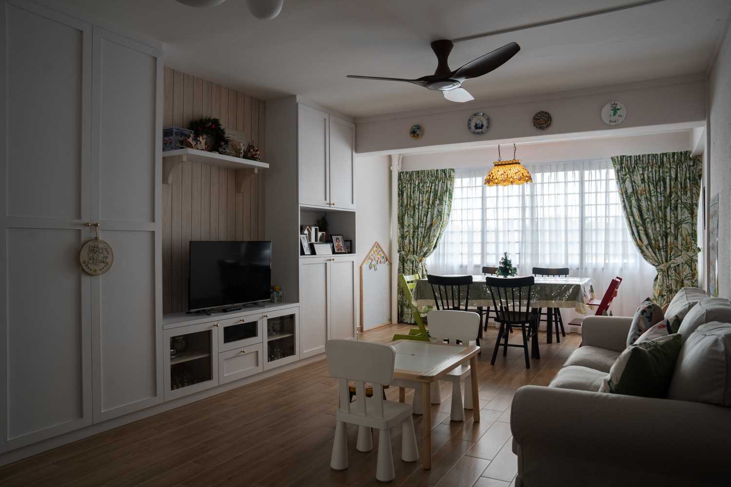 Transitional Living Room with Vinyl Flooring and Feature Wall
