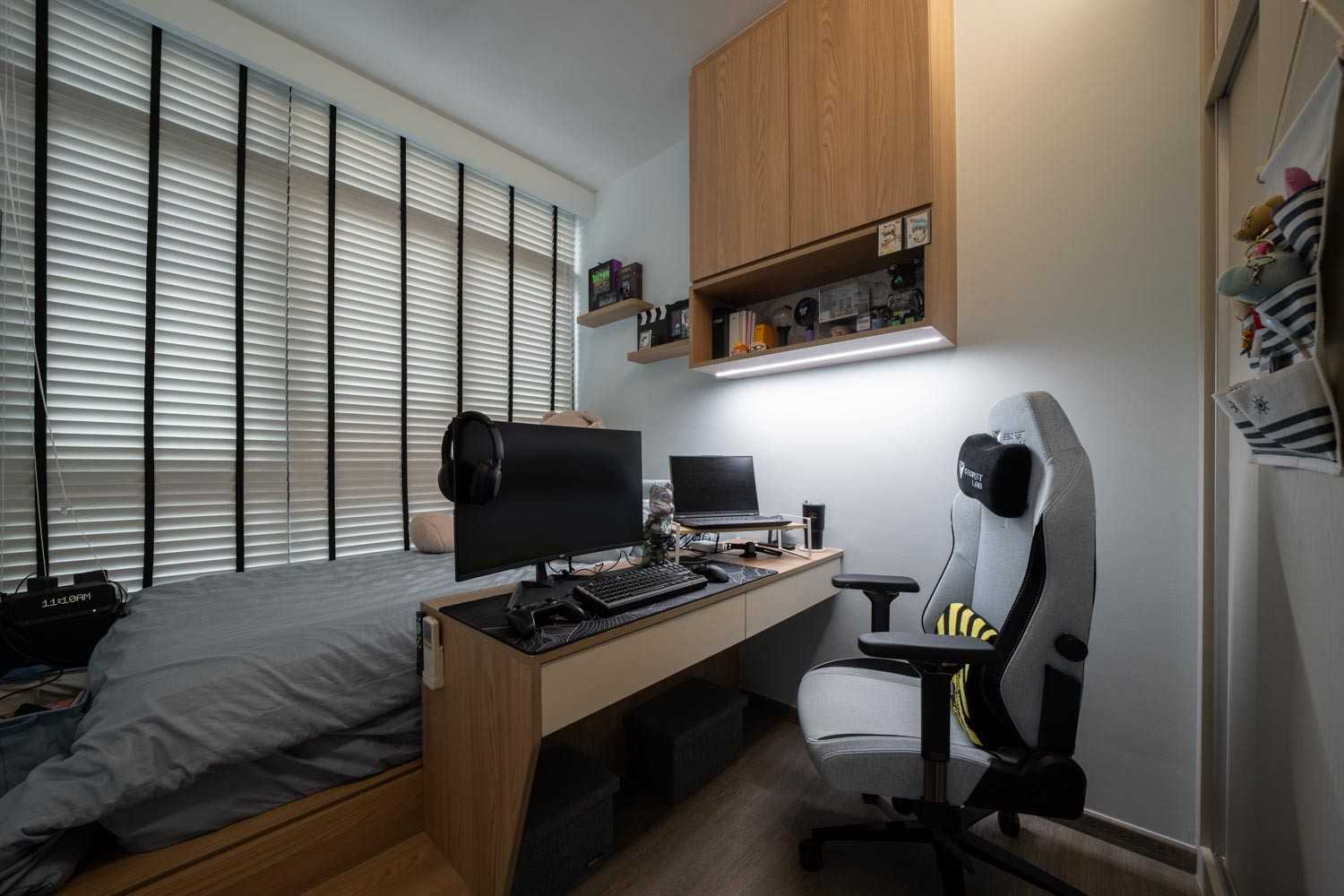Modern Bedroom with Bookshelf and Wood Flooring