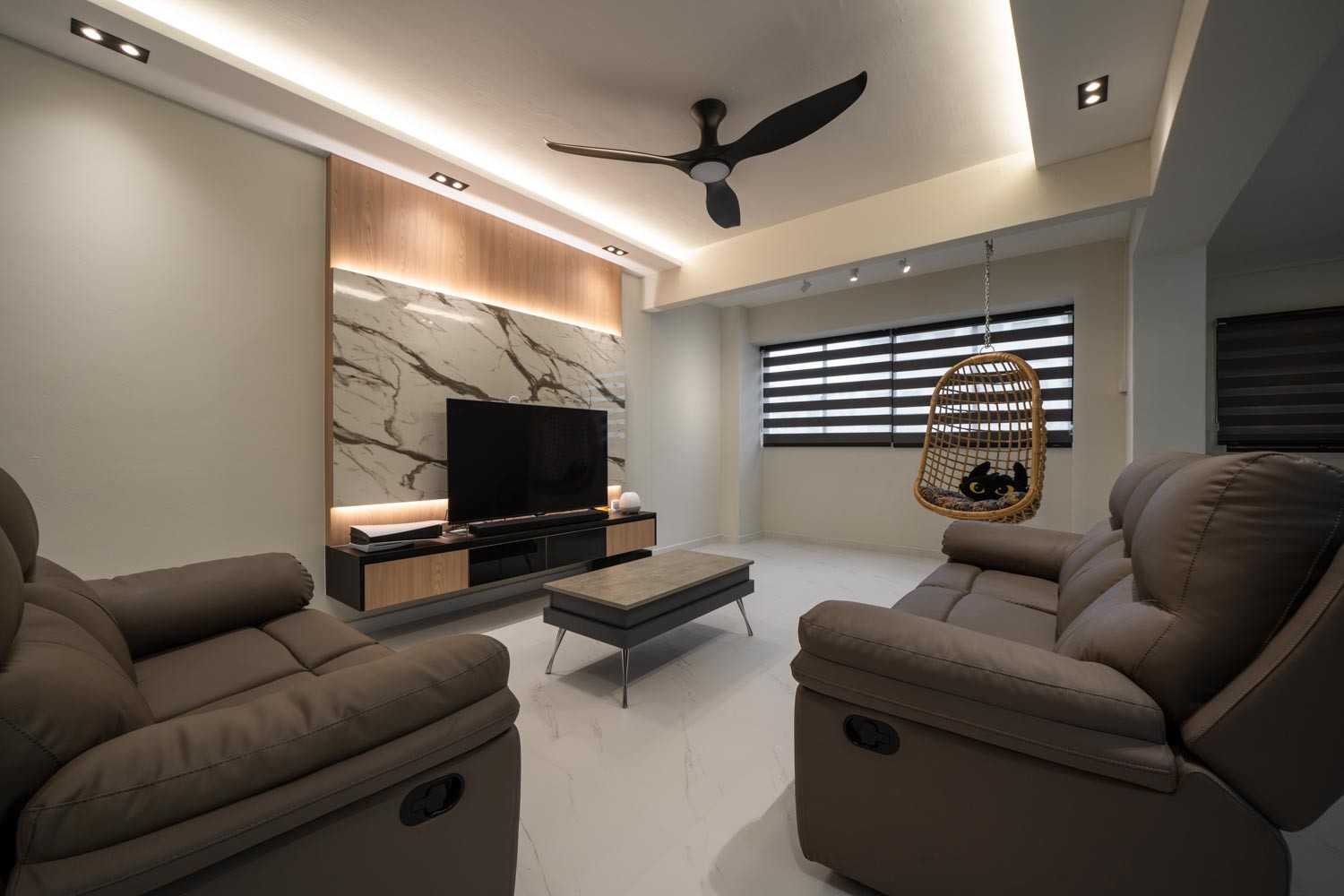 Contemporary Living Room with Homogeneous Tiles and Feature Wall