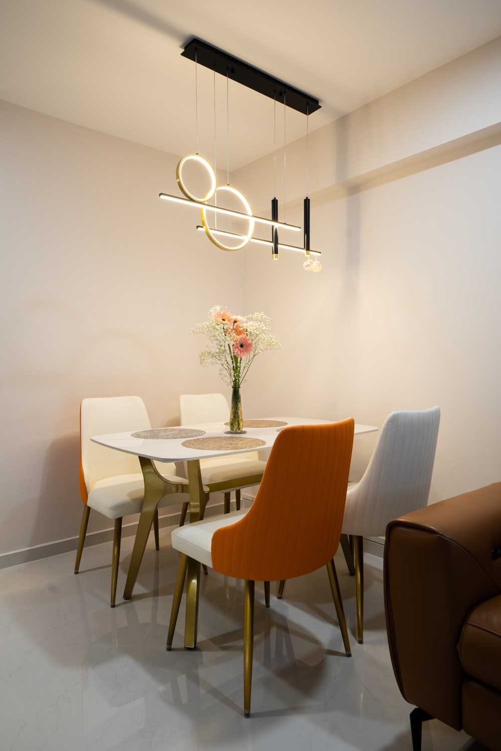 Contemporary Dining Room with Cove Lighting and Drop Ceiling
