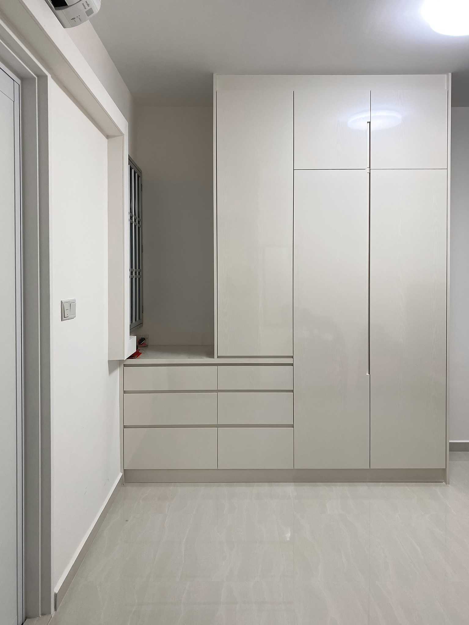 Scandinavian Bedroom with Wardrobe and Paintings