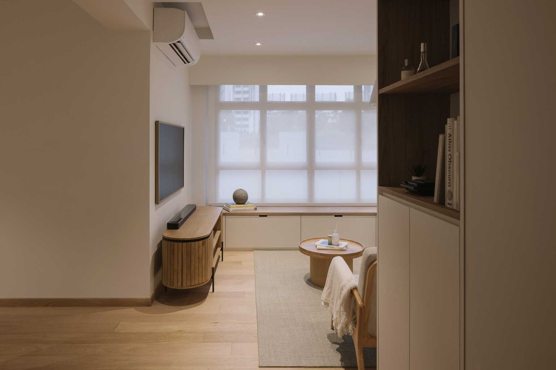 Modern Living Room with Bookshelf and Vinyl Flooring