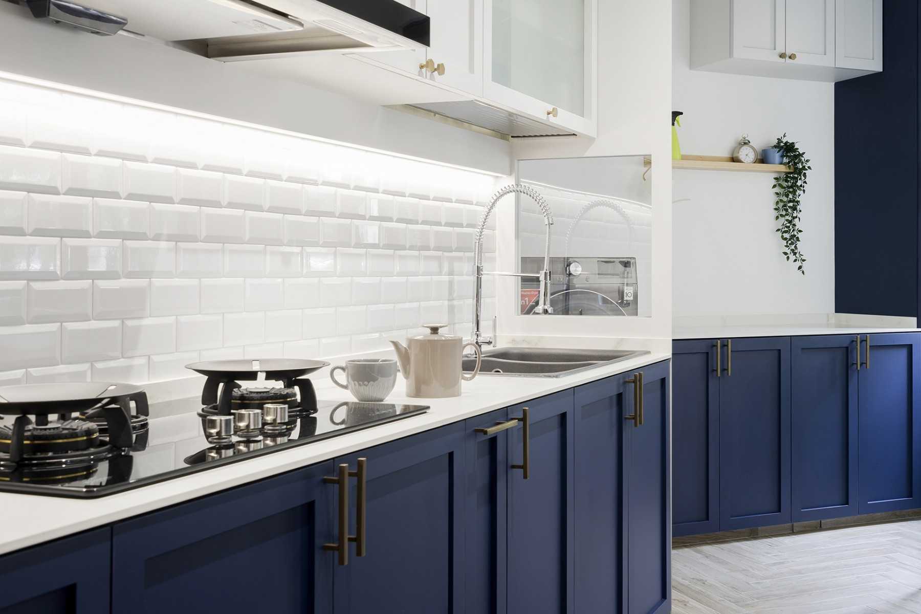 Country Kitchen with Countertop and Herringbone Tiling
