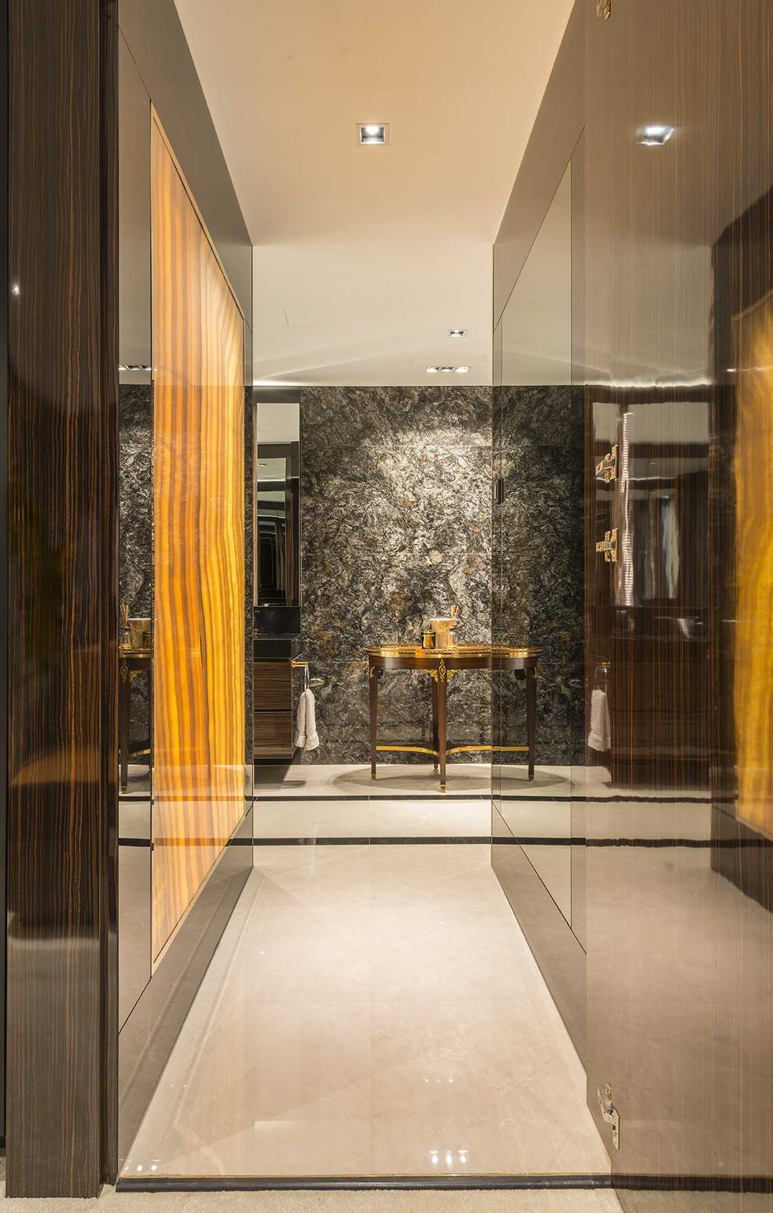 Contemporary Foyer with Feature Wall and Mirror
