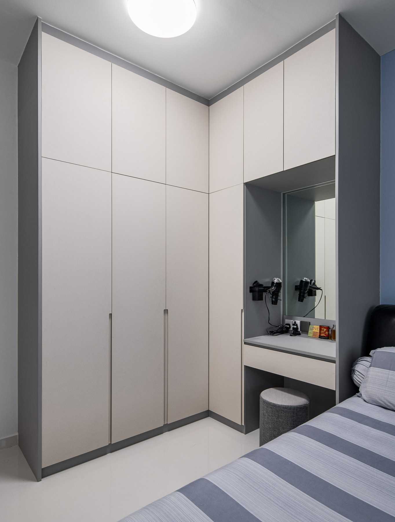 Scandinavian Bedroom with Homogeneous Tiles and Wardrobe