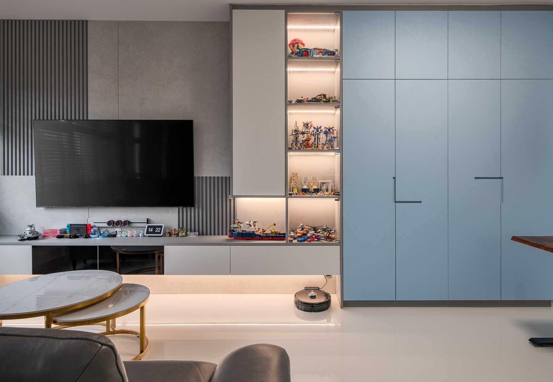 Scandinavian Living Room with Bookshelf and Homogeneous Tiles