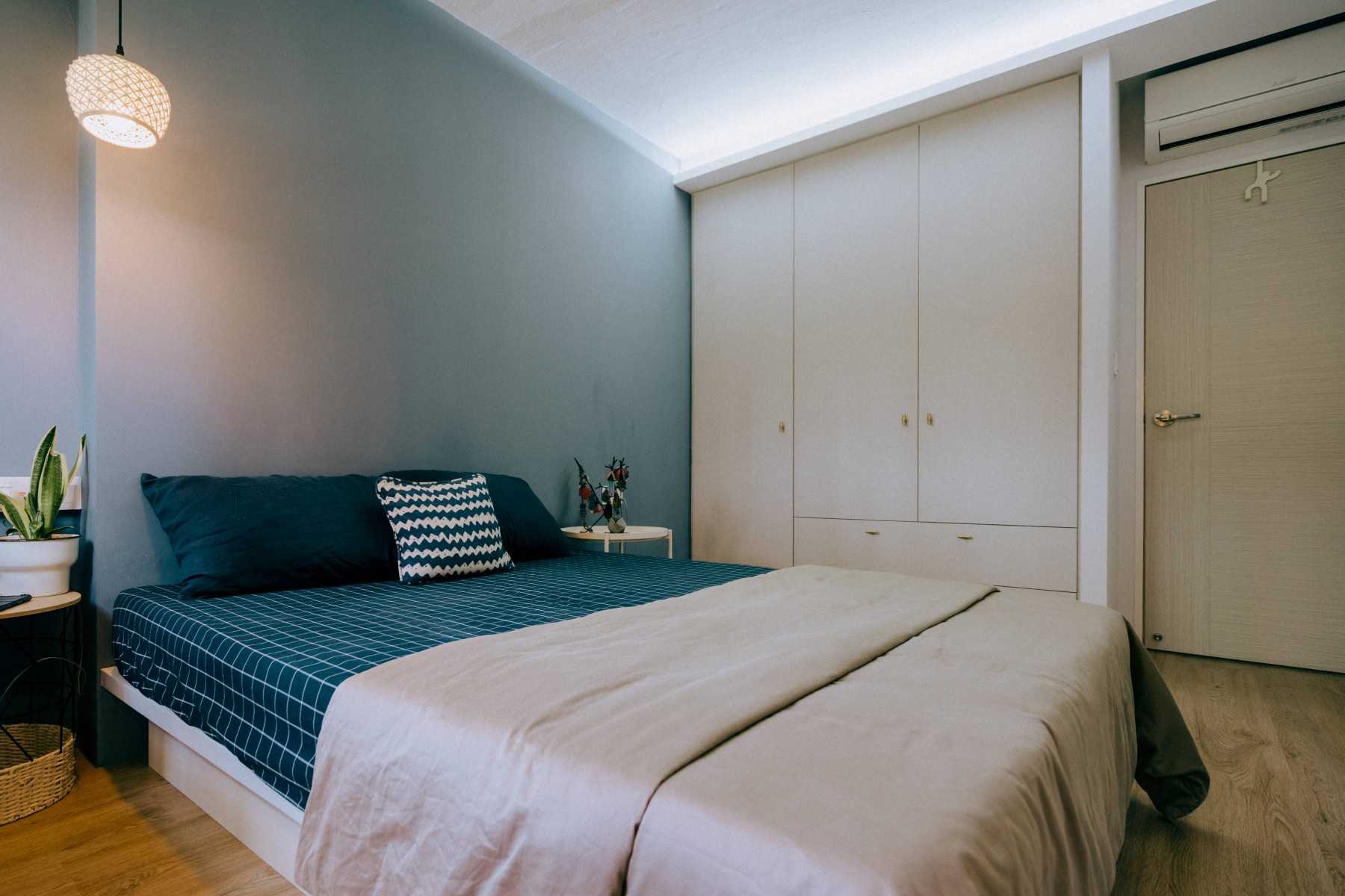 Vintage Bedroom with Drop Light and Wardrobe