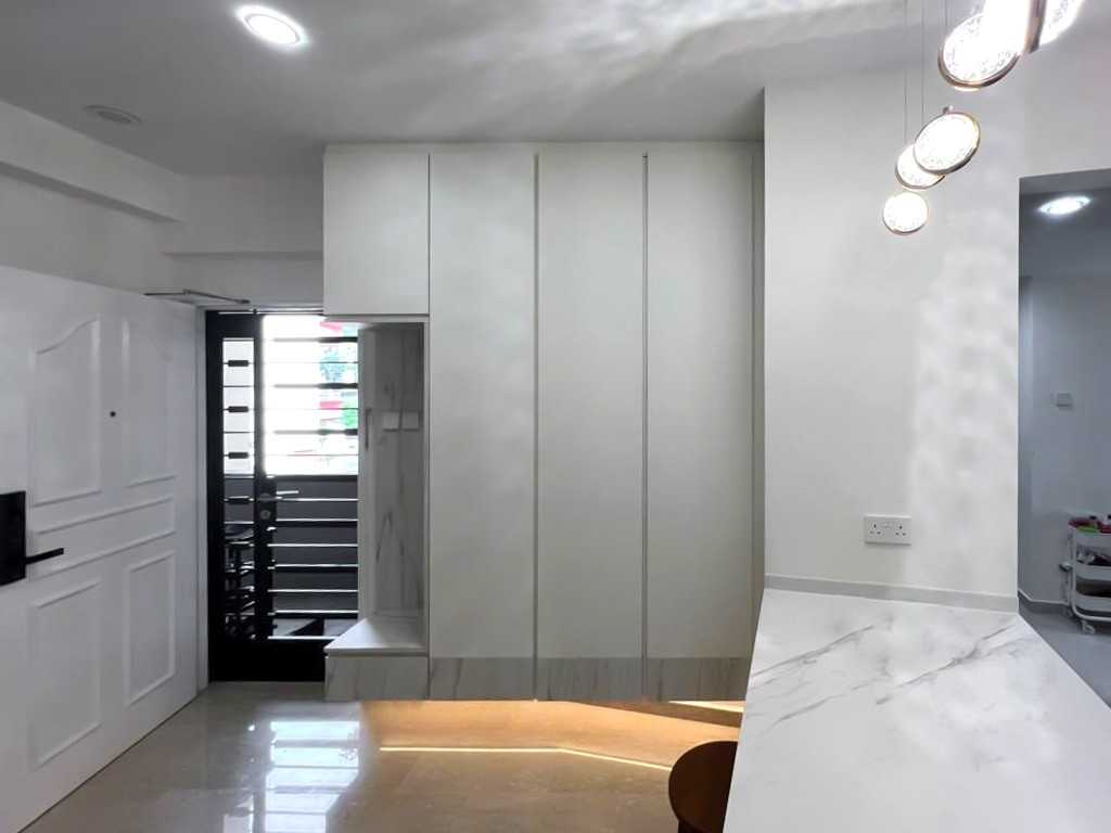 Scandinavian Foyer with Storage Cabinets and Small Storage