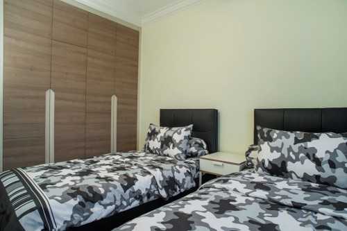 Contemporary Bedroom at Rivervale Drive