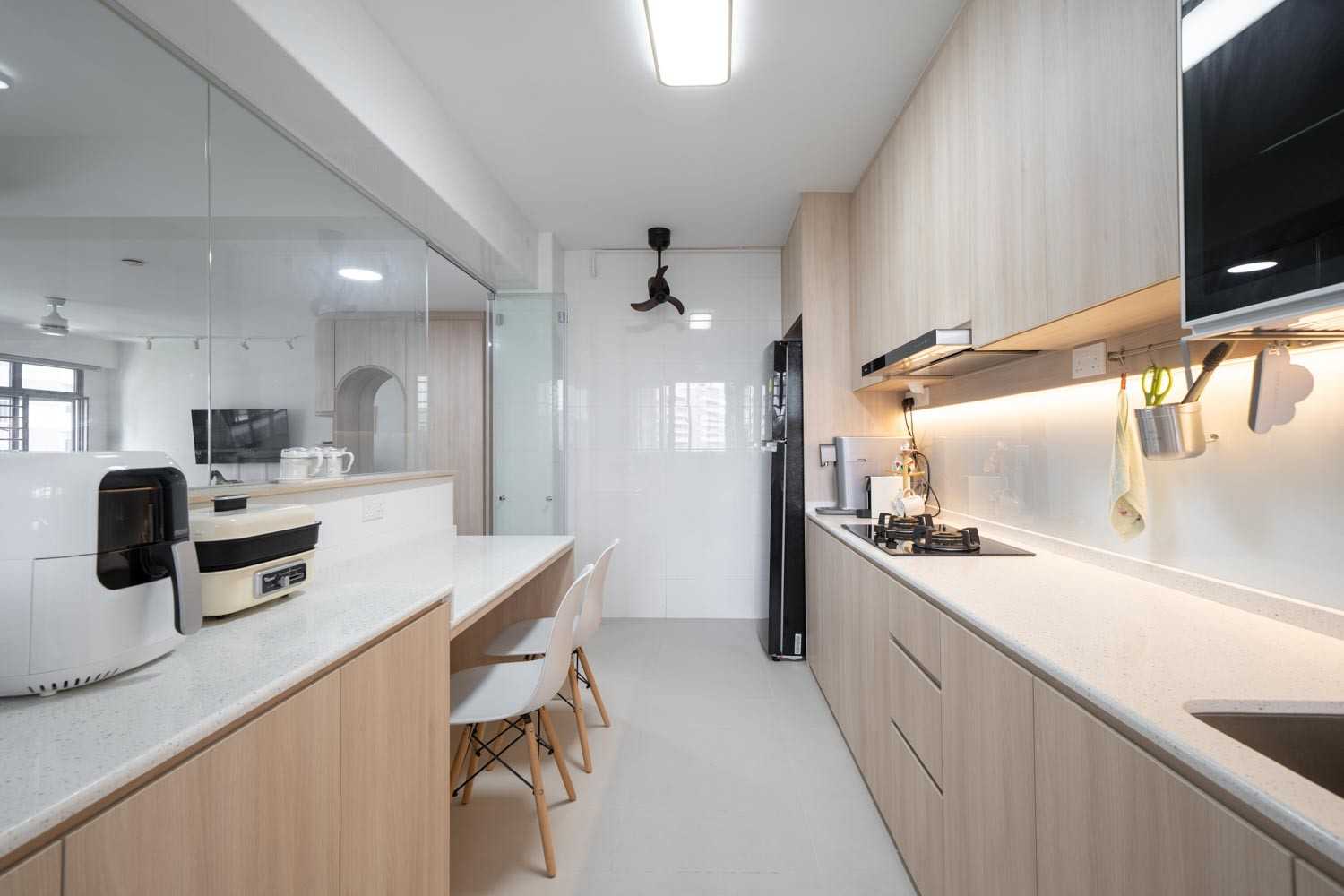 Scandinavian Kitchen with Wood Flooring and Kitchen Window