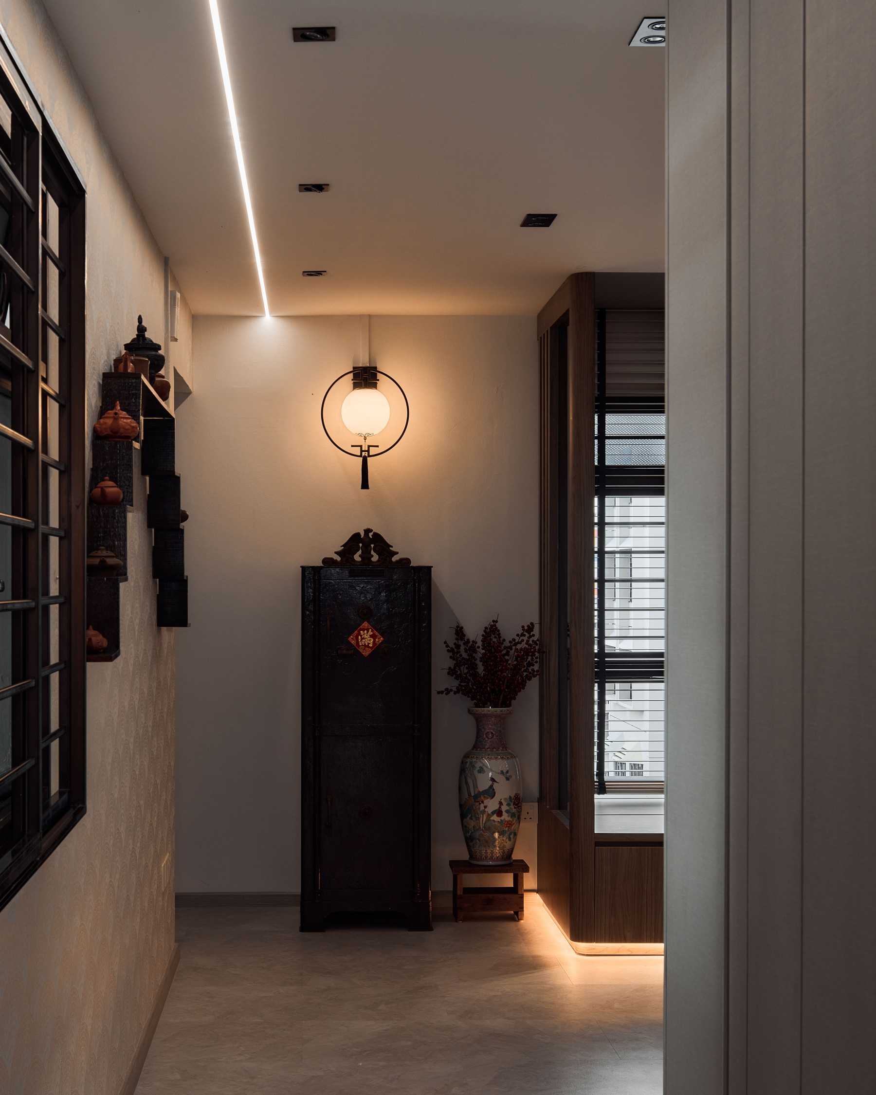Transitional Foyer with Artwork and Wallpaper
