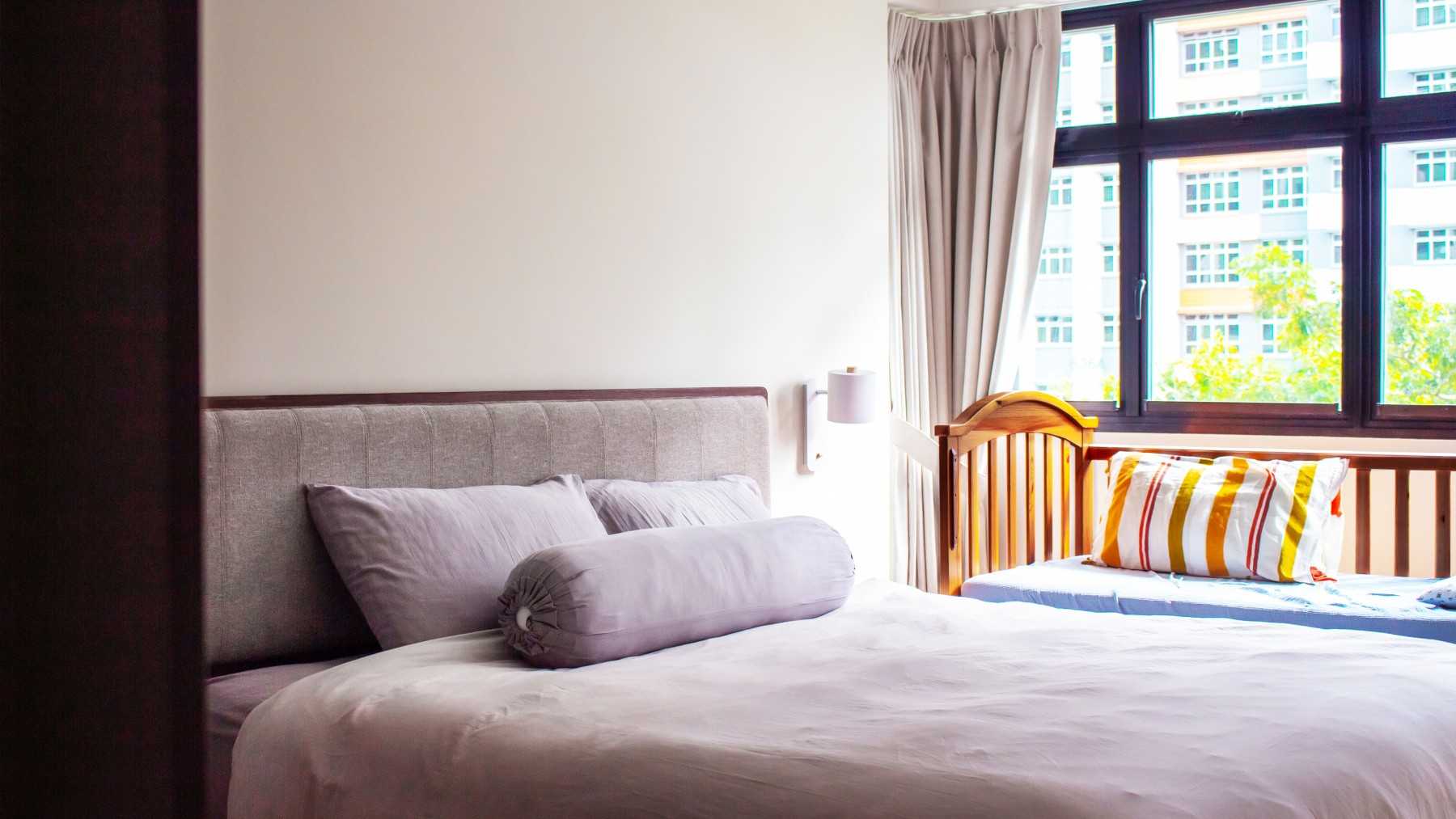 Scandinavian Bedroom with Curtain and Queen Bed