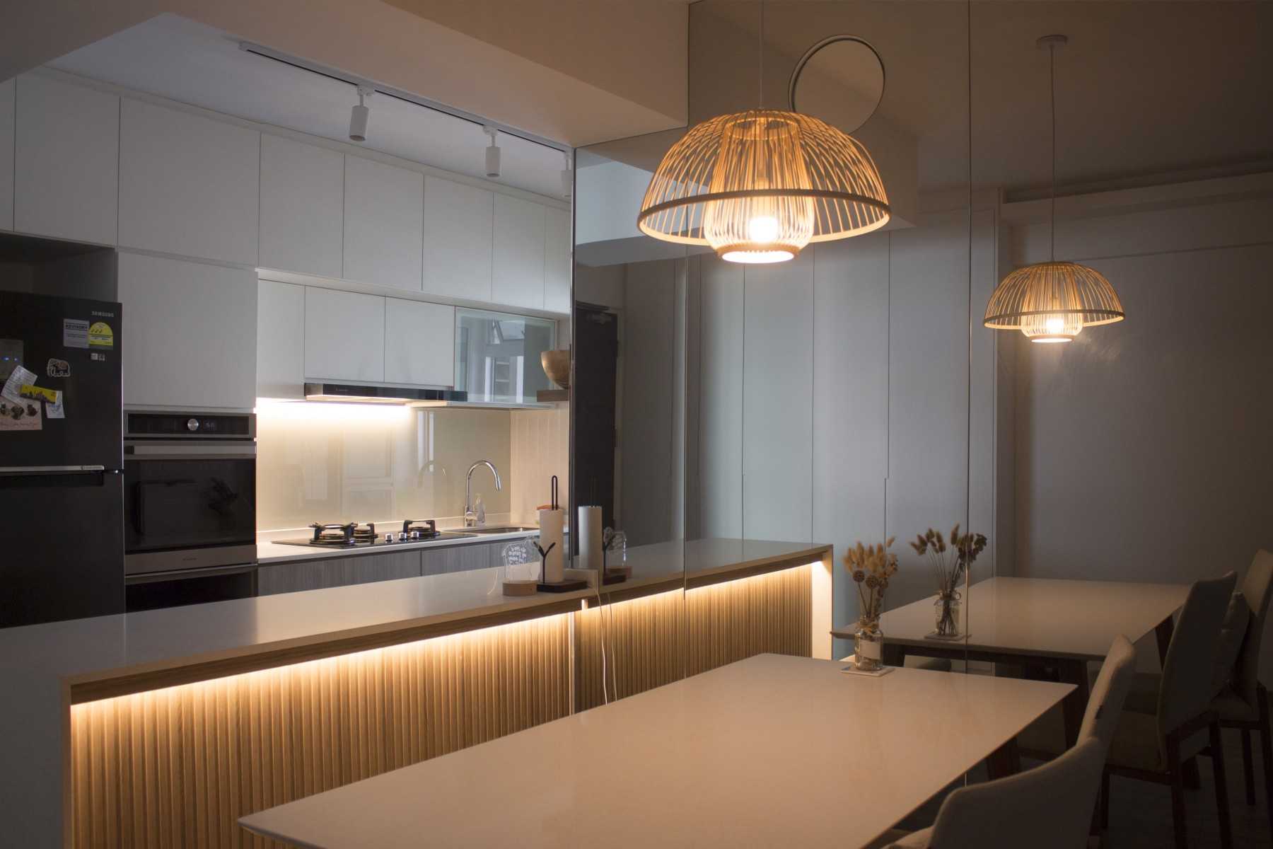 Scandinavian Dining Room with Panelling and Open Kitchen