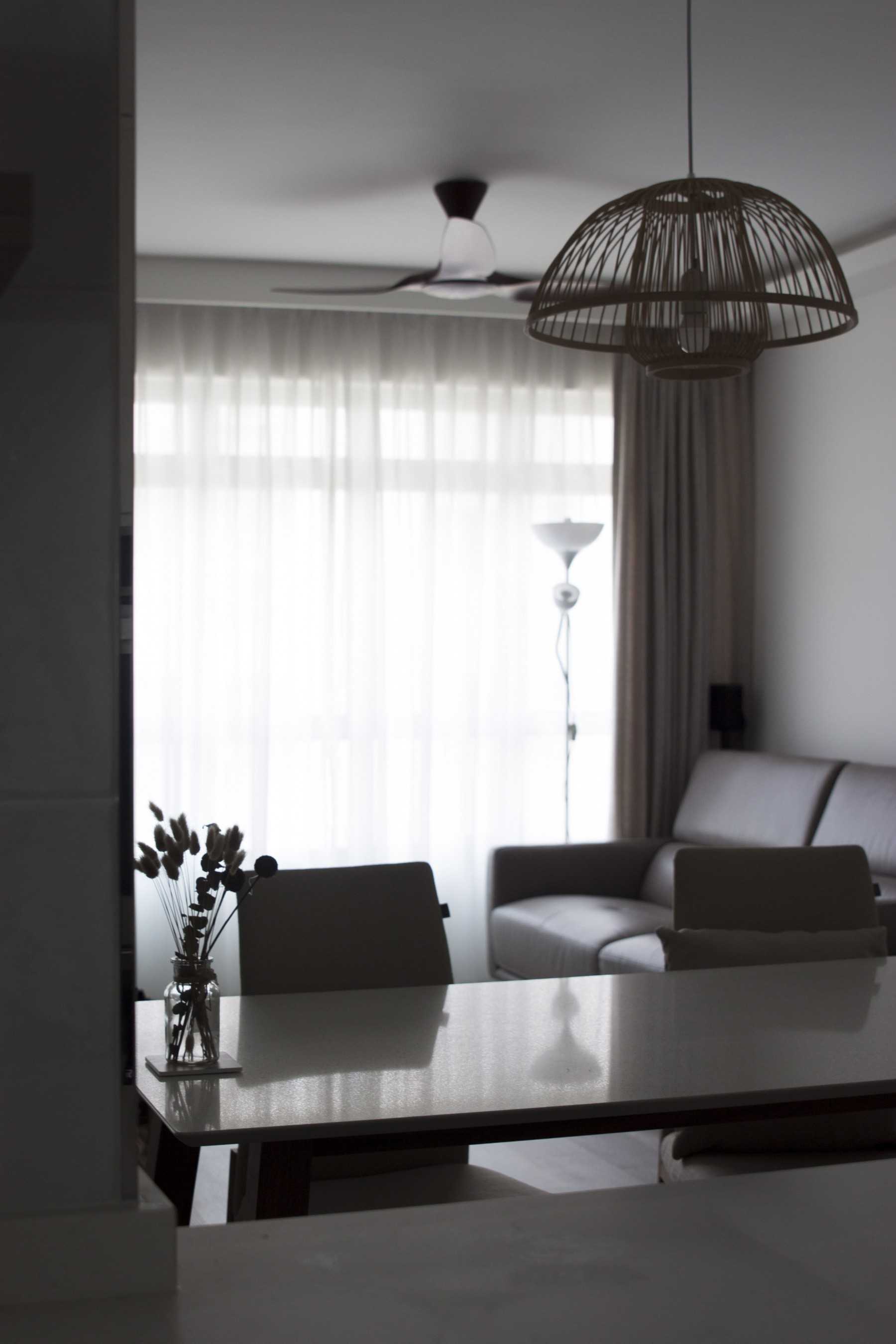 Scandinavian Dining Room with Curtain and Sofa