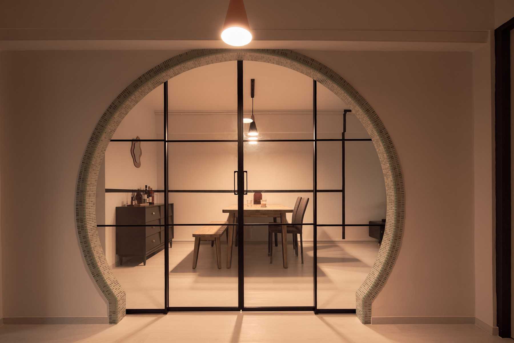 Asian Dining Room with Drop Light and Dining Table