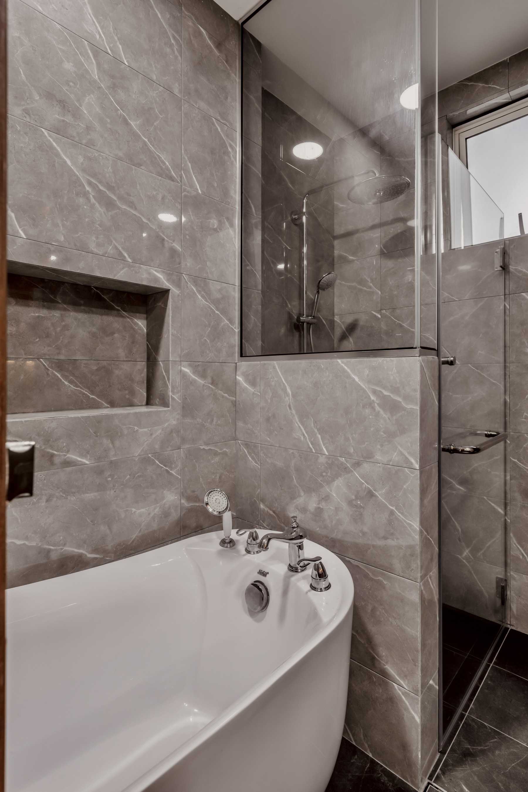 Modern Bathroom with Bathtub and Rainshower