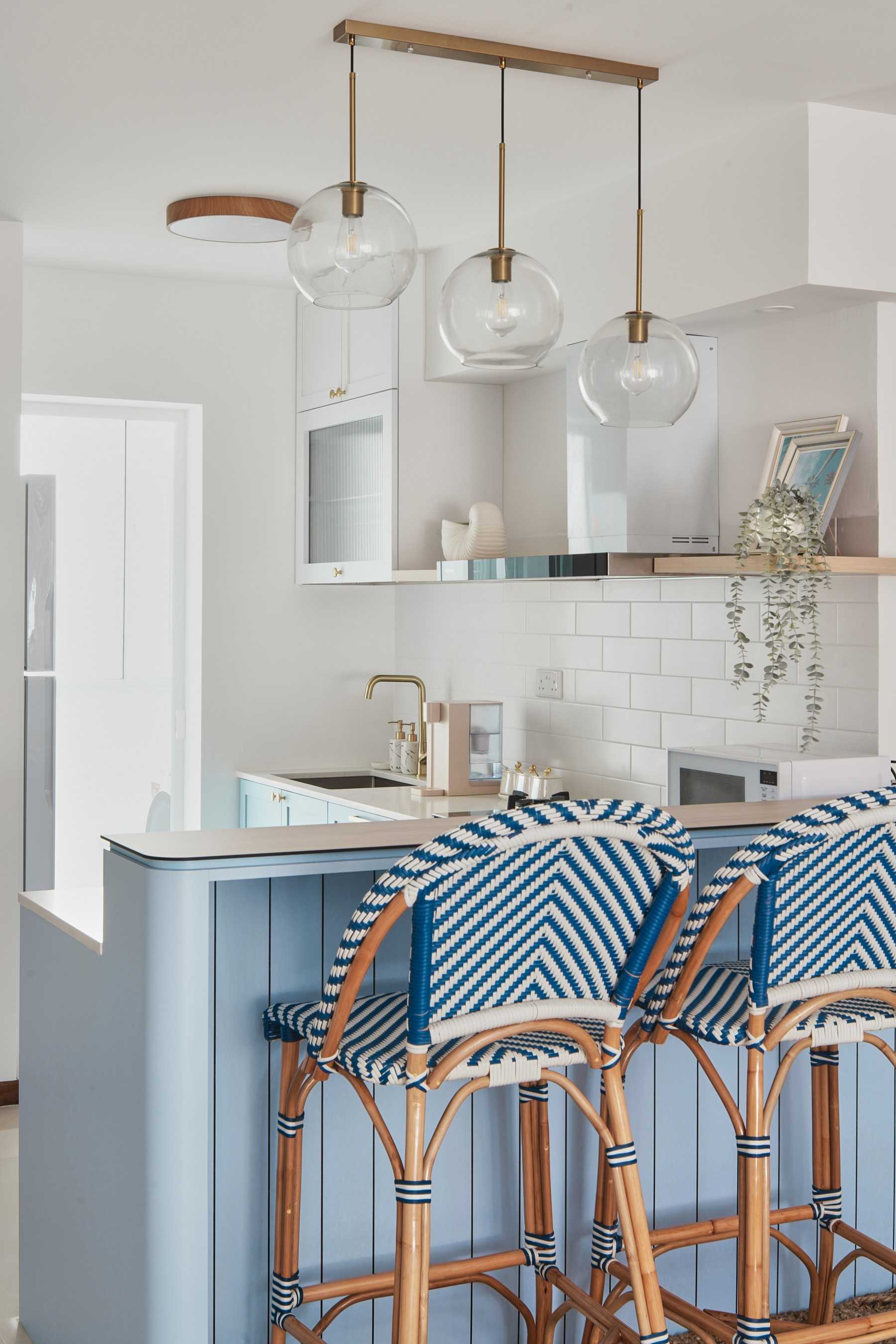 Scandinavian Kitchen with Drop Light and Open Kitchen