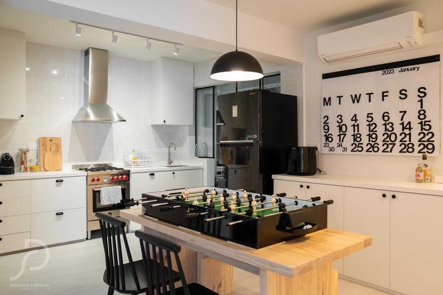 Minimalist Dining Room with Drop Light and Dining Table