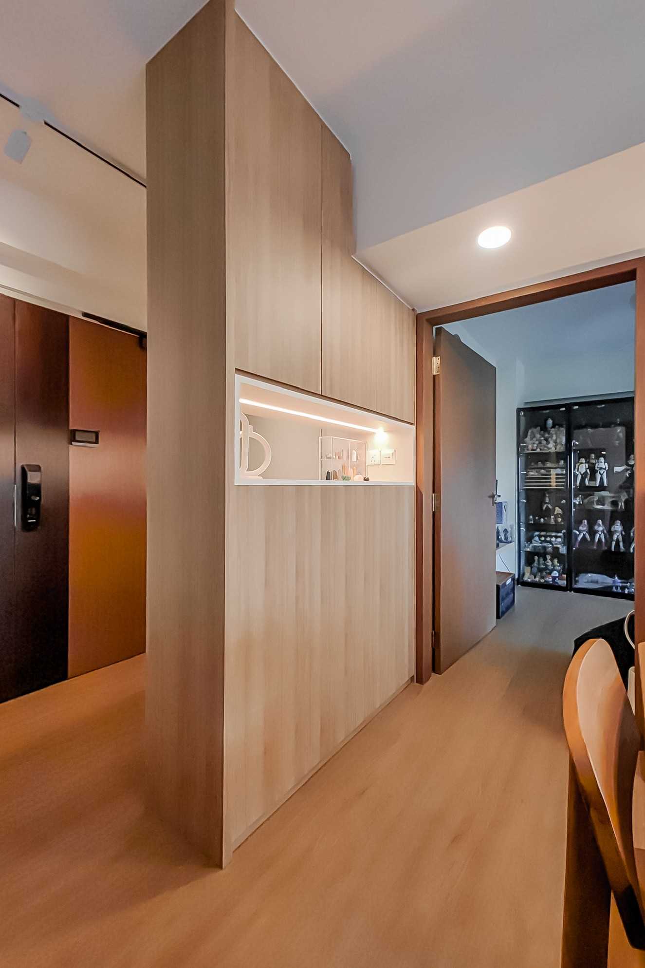 Scandinavian Hallway with Wood Flooring and Feature Wall