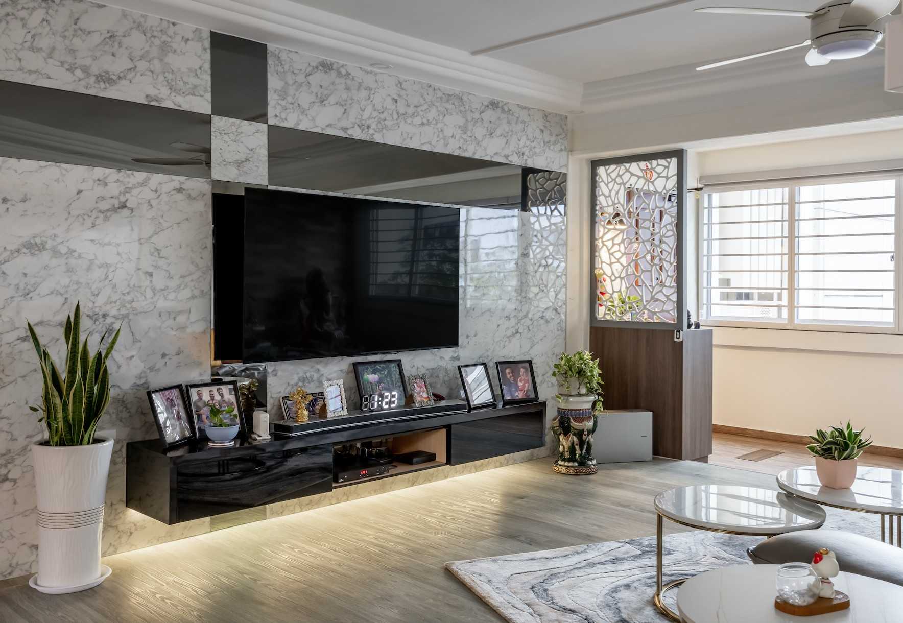 Scandinavian Living Room with Wood Flooring and Feature Wall