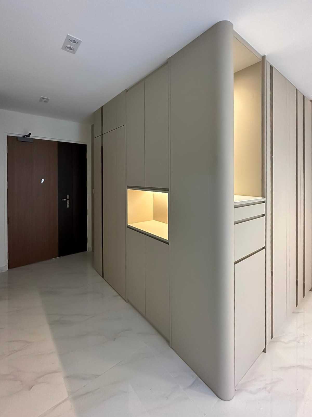 Scandinavian Foyer with Paintings and Storage Cabinets
