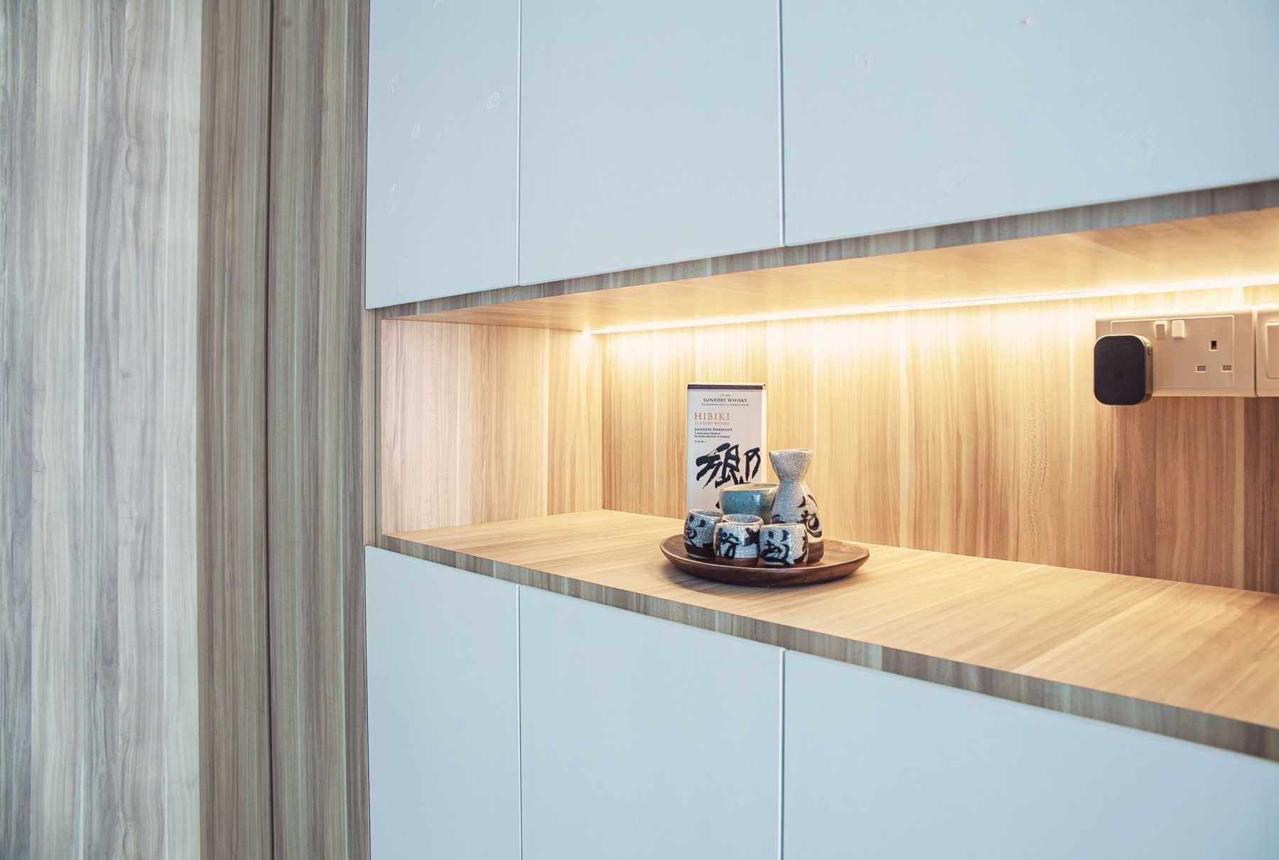 Scandinavian Living Room with Storage Cabinets and Lighting