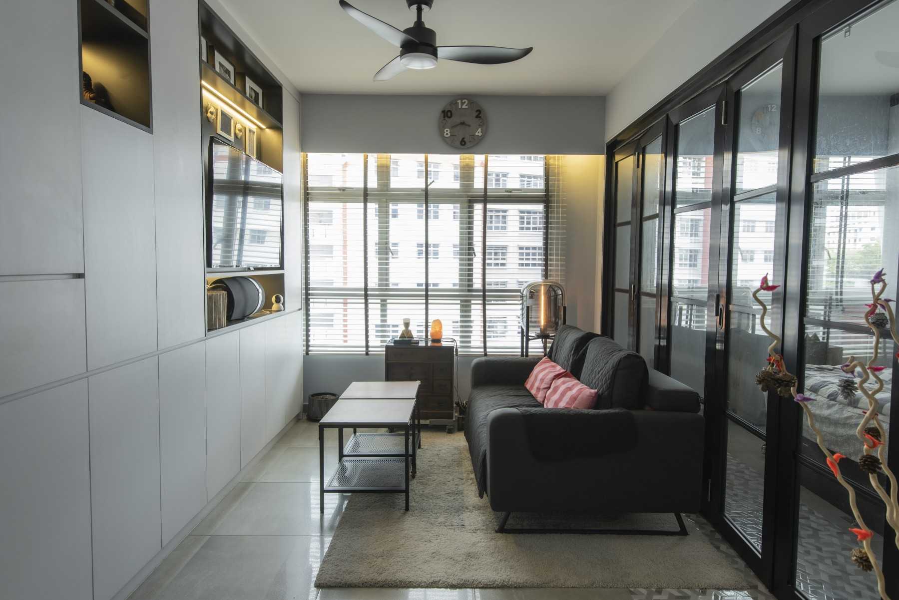 Modern Living Room with Bookshelf and Sofa