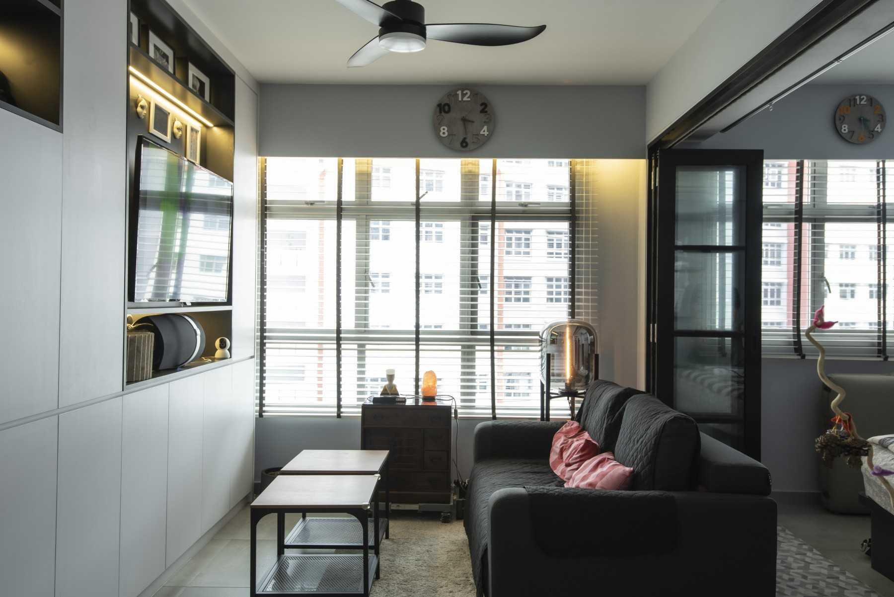 Modern Living Room with Bookshelf and Feature Wall