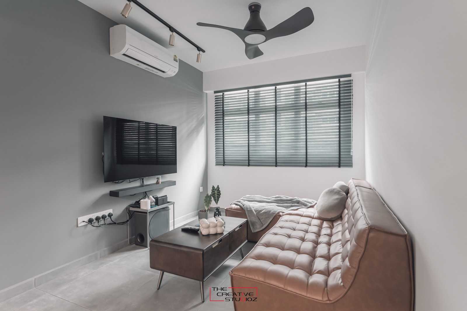 Modern Living Room with Homogeneous Tiles and Sofa