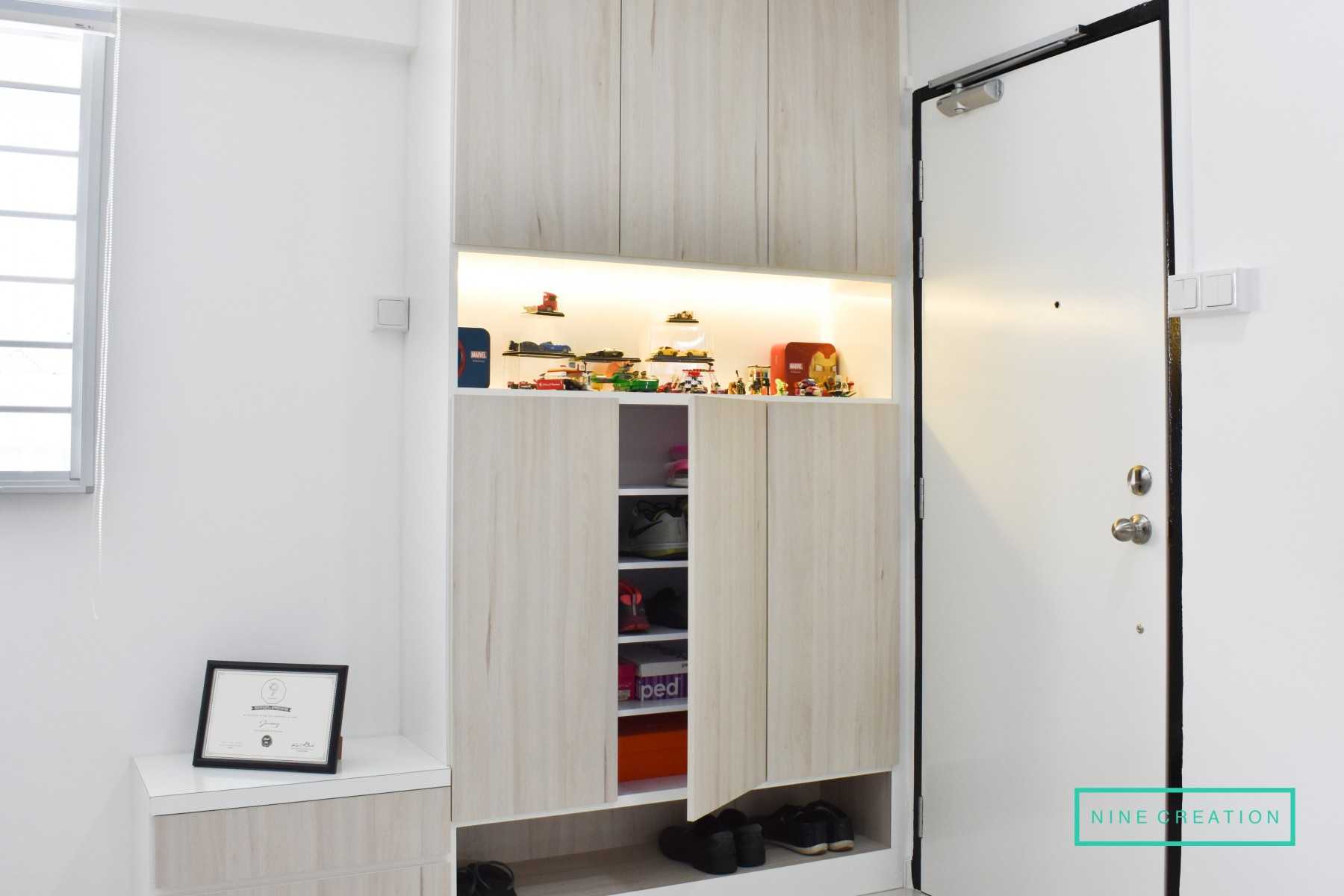 Minimalist Entryway with Seating Bench and Shoe Rack