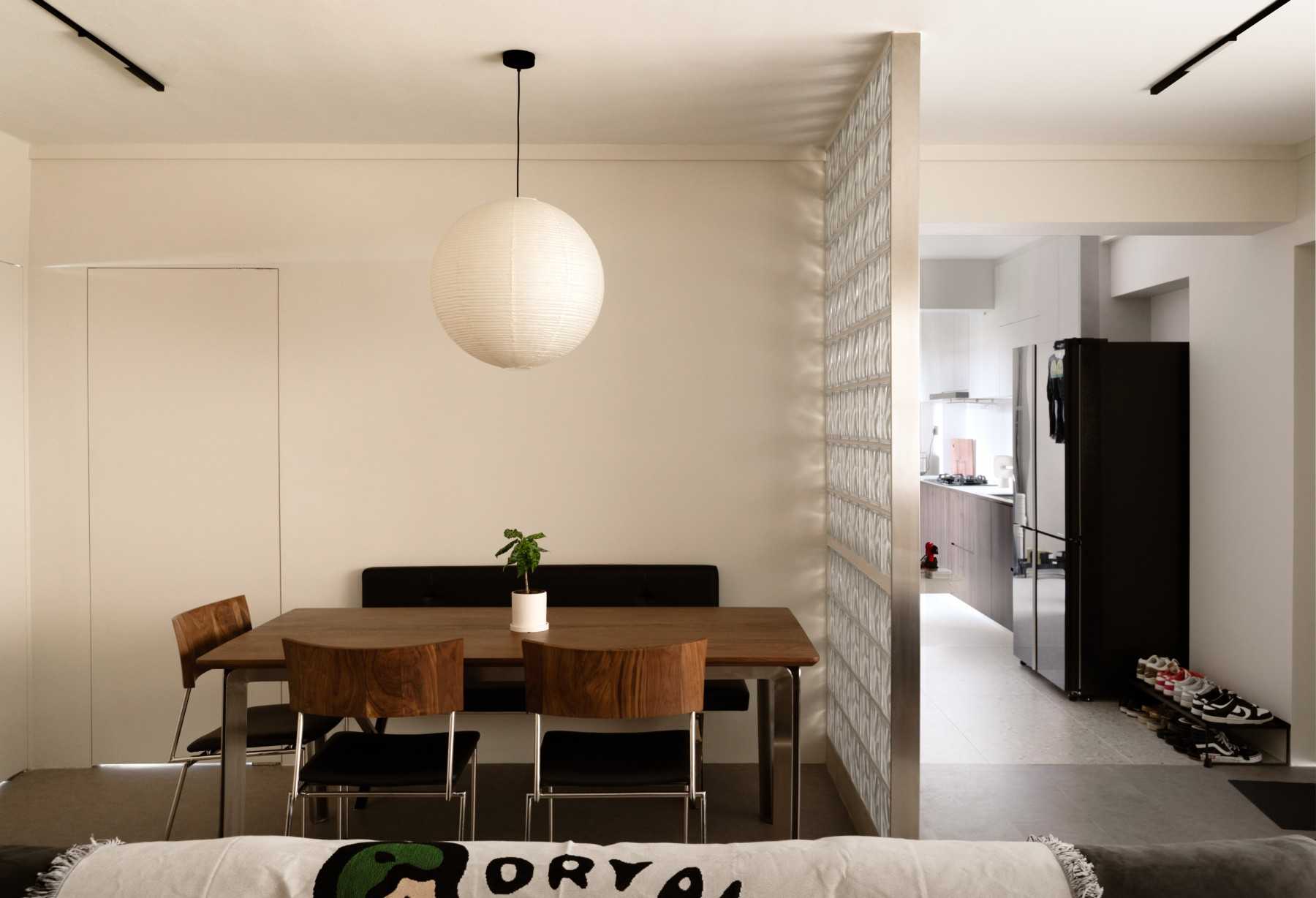Minimalist Dining Room with Feature Wall and Dining Table