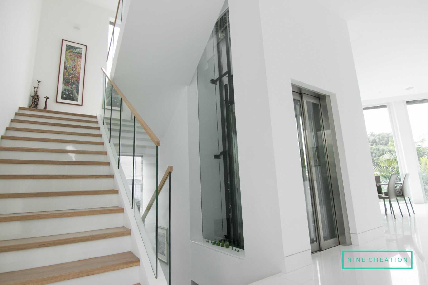 Contemporary Entryway with Mirror and Doors
