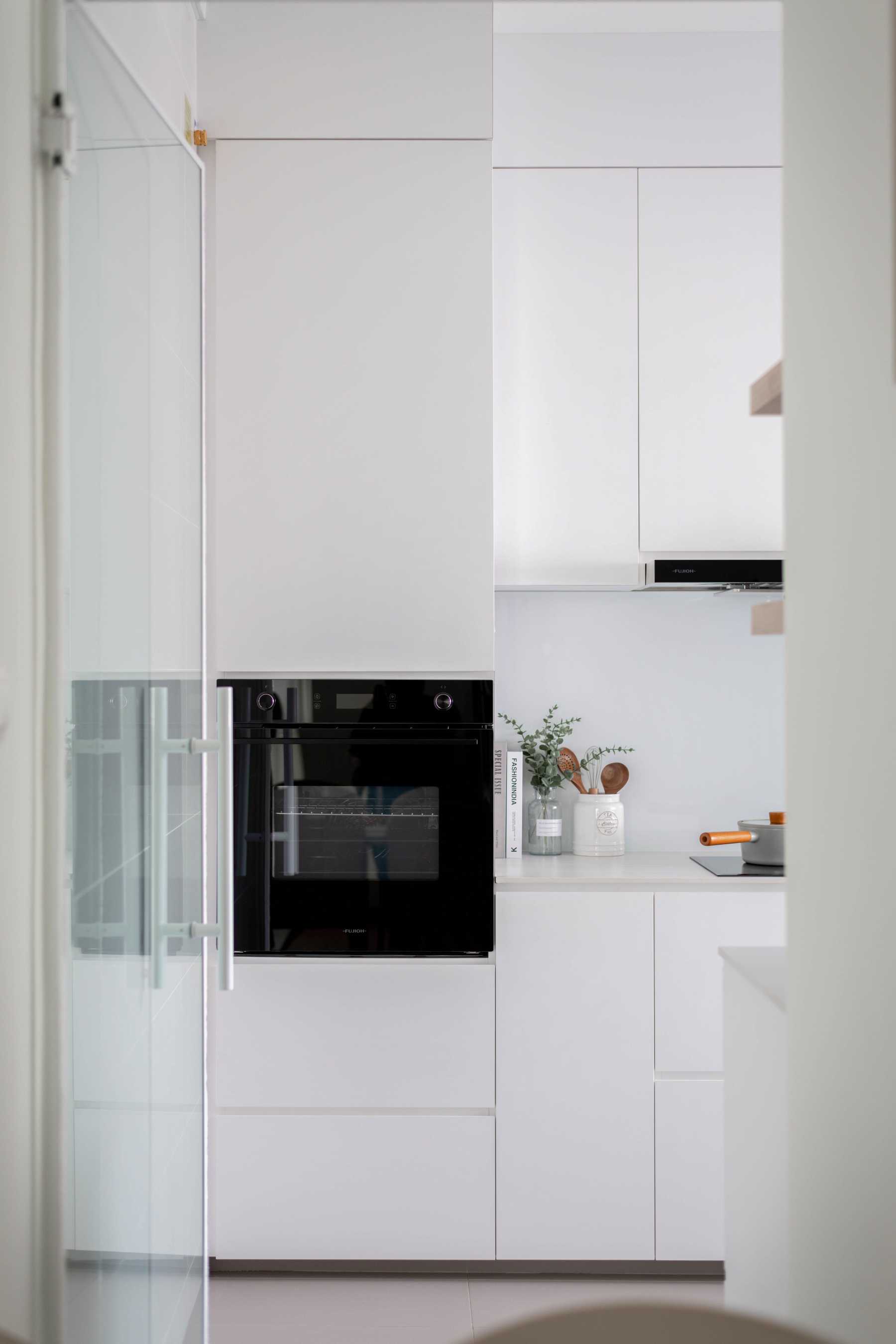 Scandinavian Kitchen with Cement Floor and Cupboard