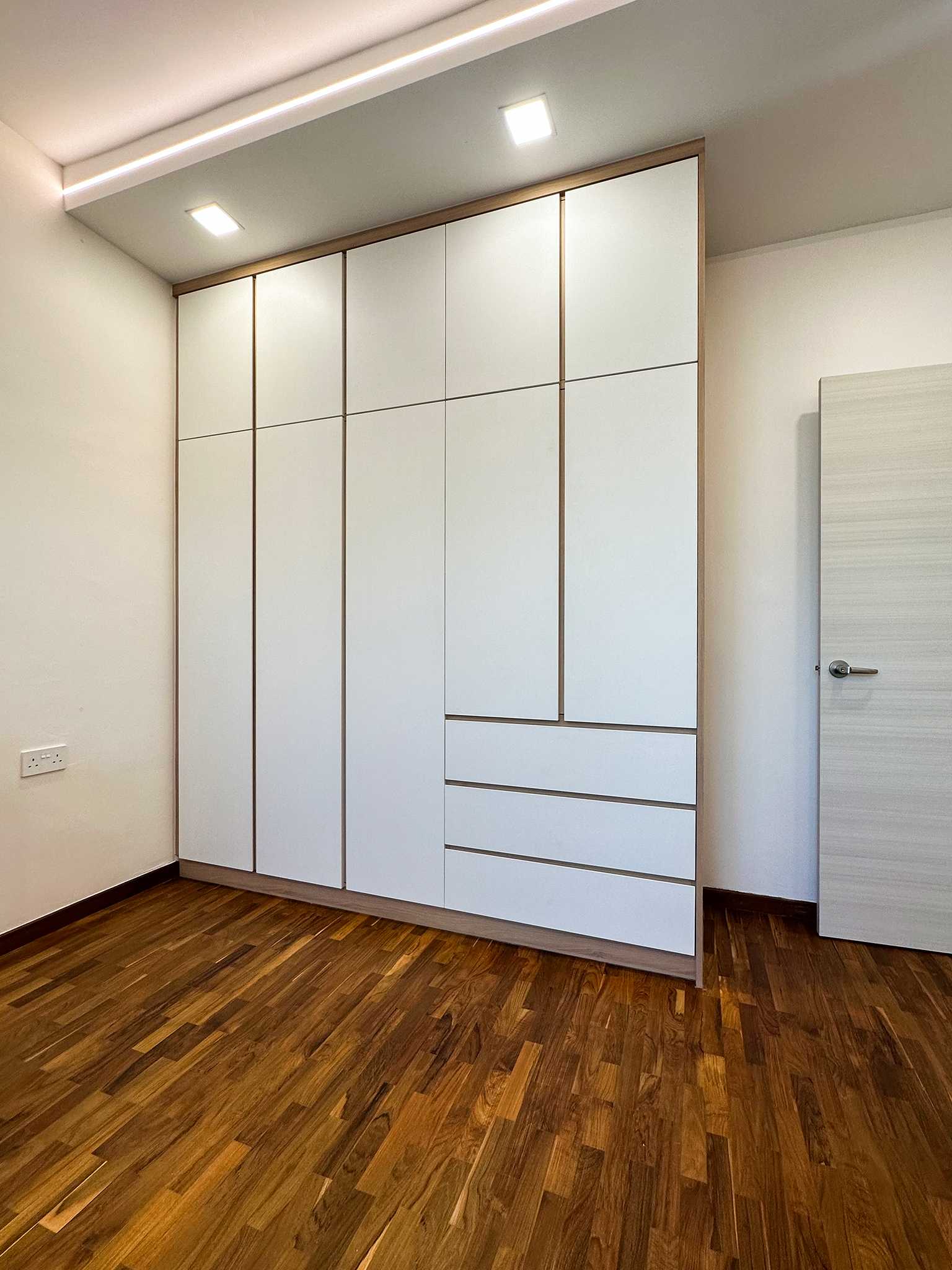 Scandinavian Bedroom with Wardrobe and Paintings