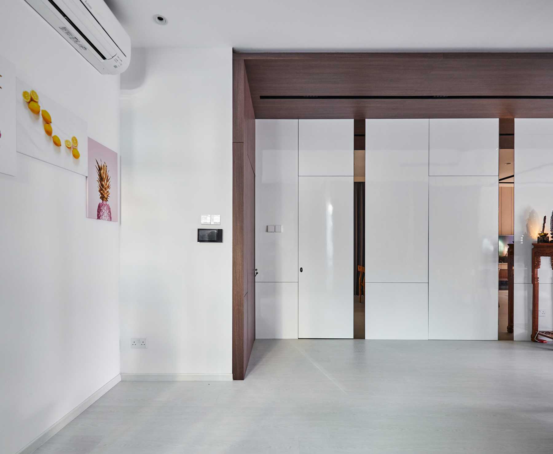 Scandinavian Dining Room with Panelling and Paintings