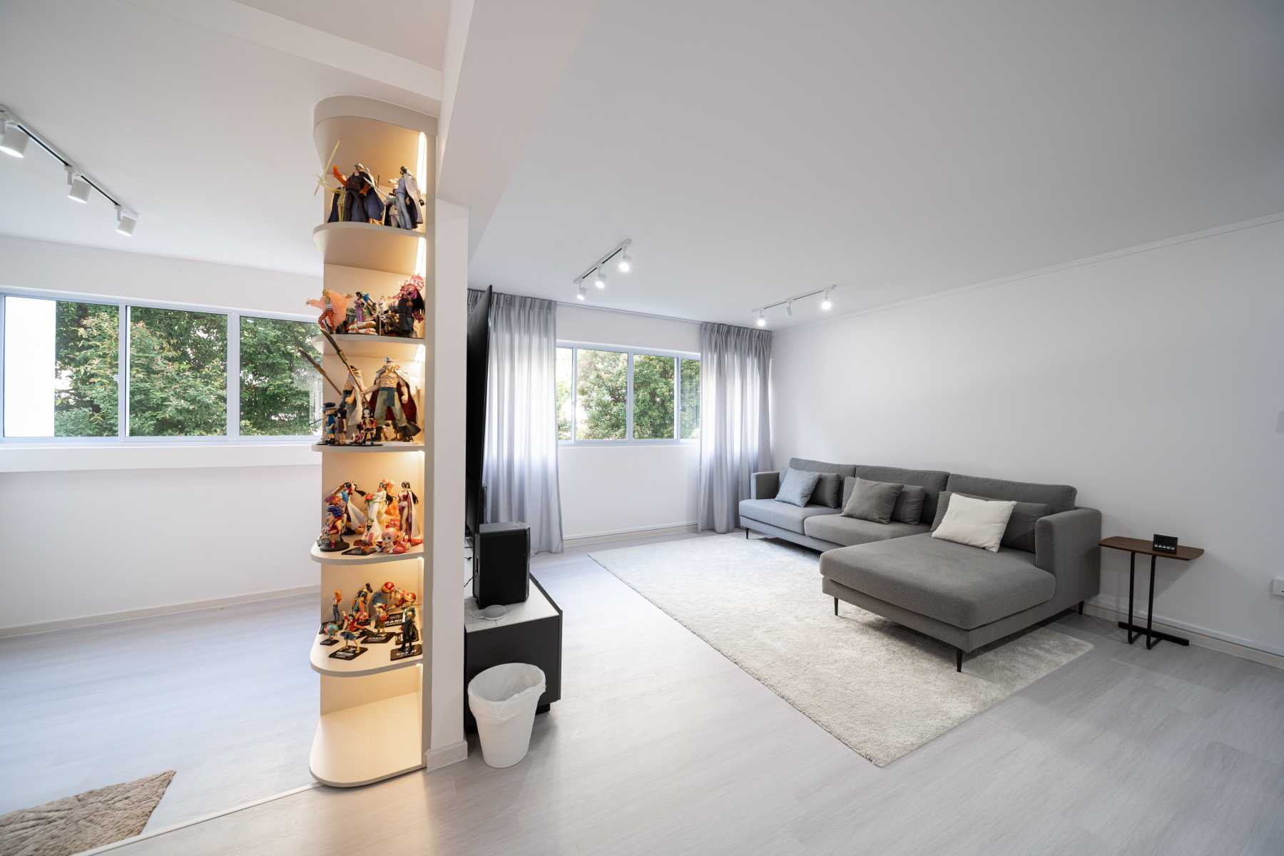 Scandinavian Living Room with Bookshelf and Vinyl Flooring